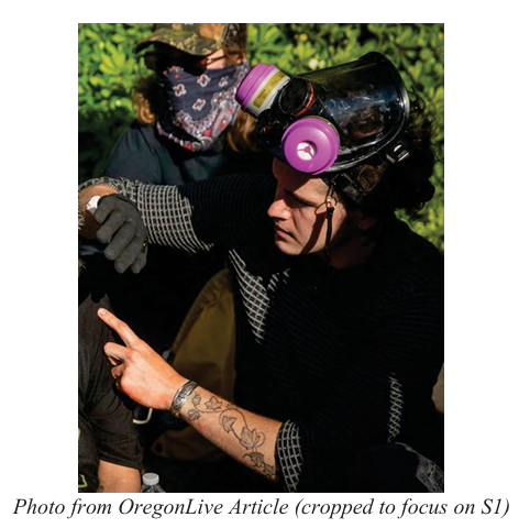Update: The FBI affidavit has been unsealed.

FBI agents identified Hoopes as the suspect through facial recognition software after a photo of him tending to a protester was featured in a local paper several days after the incident.

Link to affidavit: scribd.com/document/89431…