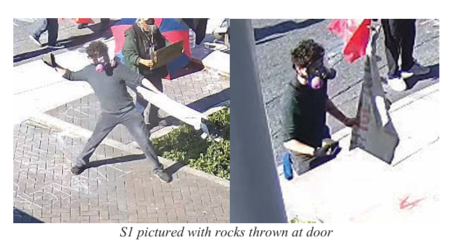 Court filings include still images from surveillance video showing Hoopes allegedly throwing rocks and using a stop sign as a "battering ram."