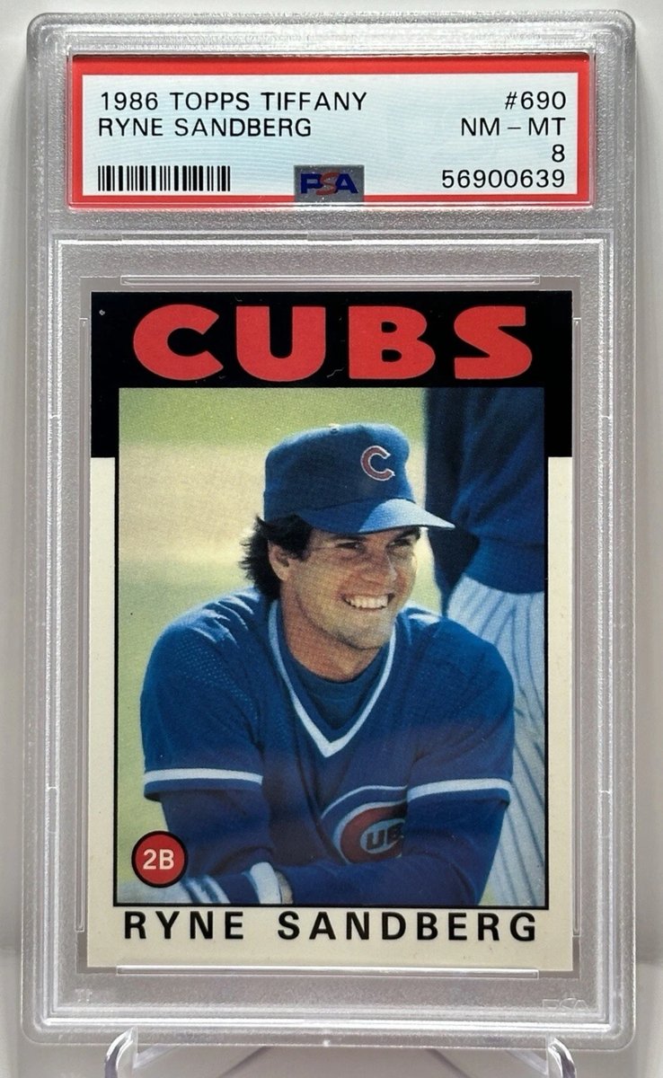 Here's a picture of a baseball card I love. Not because it's expensive or rare but because when I see it, it makes me happy. Because it reminds me of being 9, ripping wax and seeing my favorite player smiling back at me from the tiny piece of cardboard. RIP Ryno.