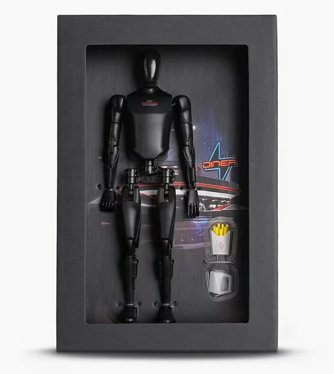 SawyerMerritt's tweet image. Here’s the exclusive Tesla Diner merchandise:
• All-black Tesla Bot action figure
• Tesla Supercharged Gummies: Includes three sweet and sour flavors: Dog Mode Chill, Mango Bolt and CyberBerry.
• Trucker hat
• Retro diner tee