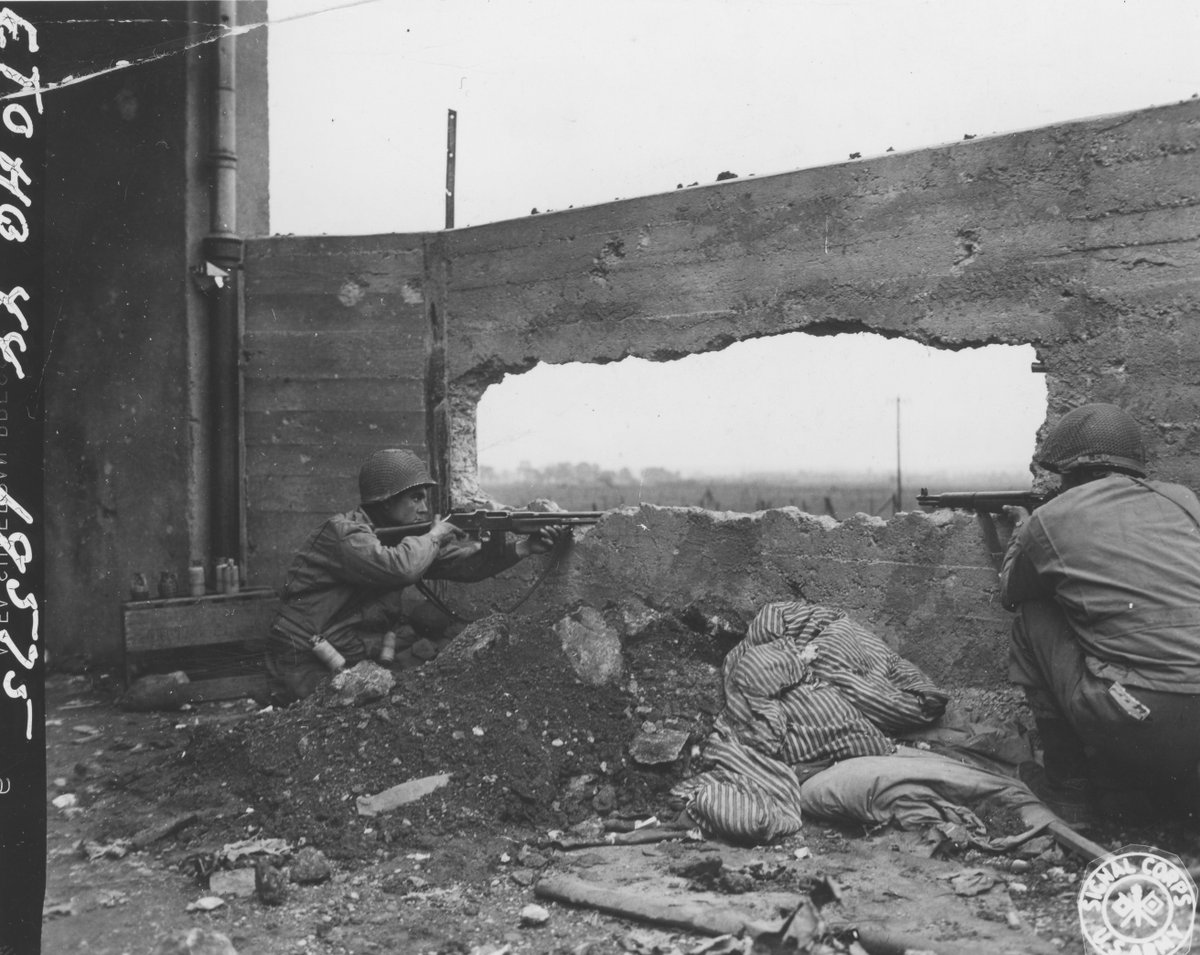 WW2Facts's tweet image. Pfc. Lawrence Hoyle, left, of Bangham, Ill., and Pvt. Andrew Fachak, right, of McKeesport, PA, take shelter behind a blasted wall and keep an eye out for enemy snipers near Maizeres Les Metz, France, on November, 1944.
#History #WWII