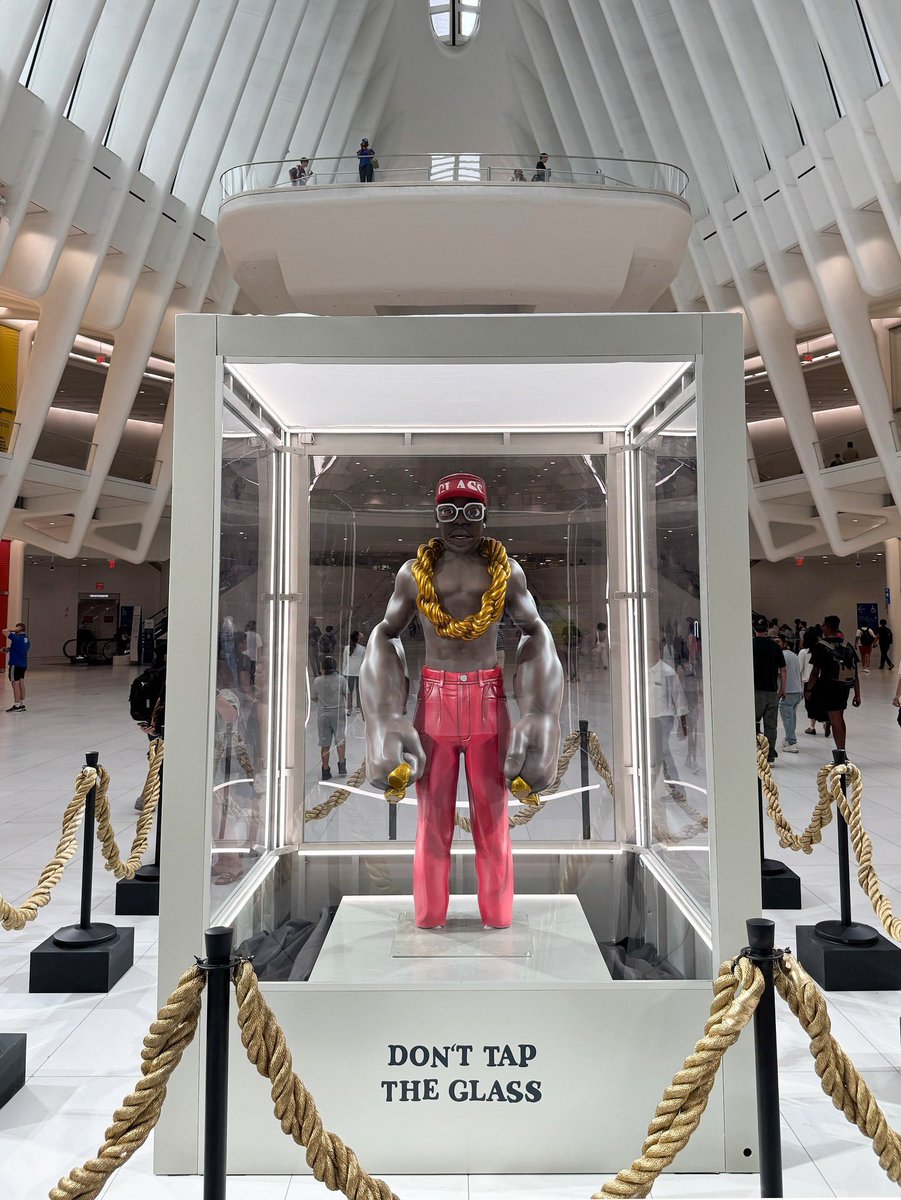 GalactaMag's tweet image. Tyler, The Creator's 'DON'T TAP THE GLASS' statue spotted at the World Trade Center
