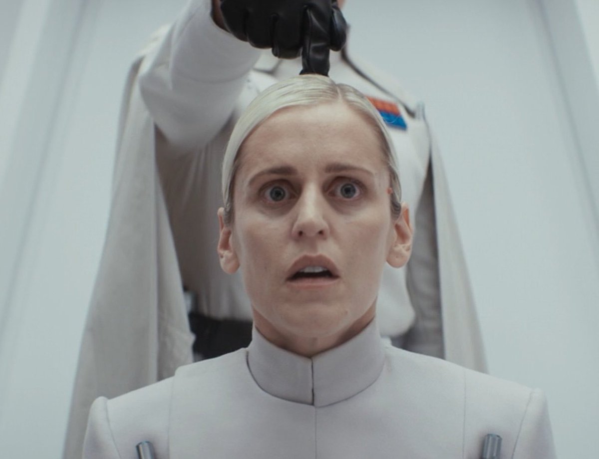 sw_tweets's tweet image. Krennic placing his finger on Dedra’s head wasn’t in the #Andor S2 script — Ben Mendelsohn improvised it 👇
