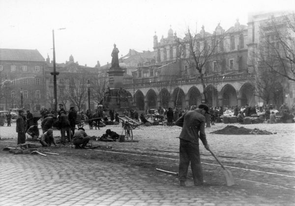 Deeteem1's tweet image. Krakow Poland under Nazi German occupation in front of St. Mary's Basilica.