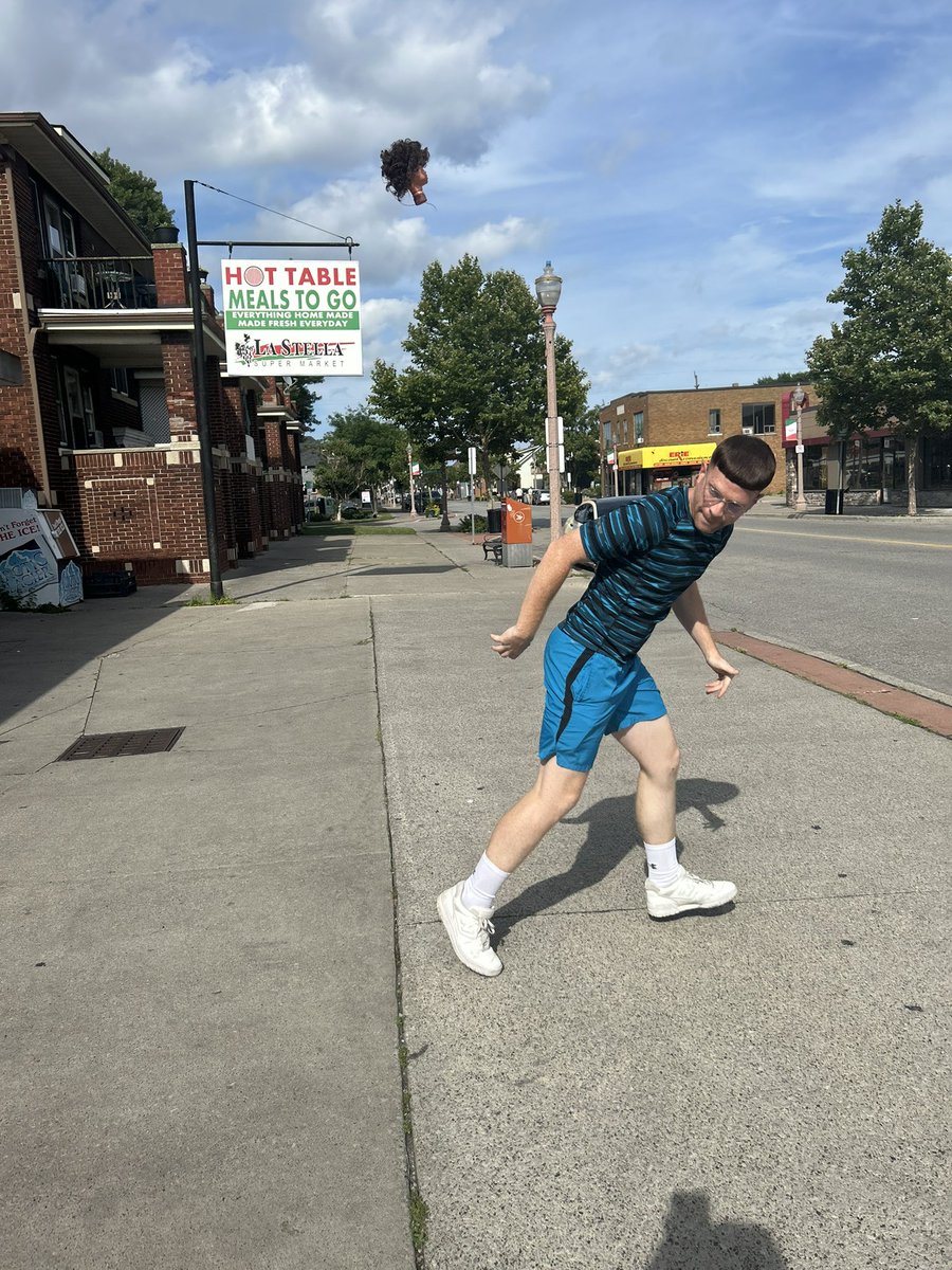 Parrott Rainbow Flicks A Plastic Baby’s Head In Little Italy (2025)