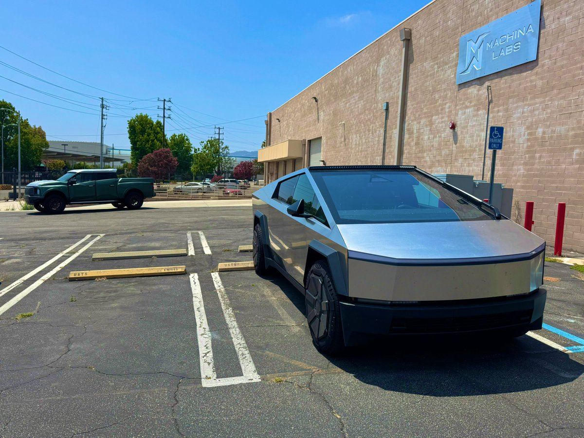 EdwardMehr's tweet image. Machina East facility parking lot. Choose your fighter:
1- Anvil, hand forged by robots with curves built for the apocalypse
2- Cybertruck, sleek and shiny but let’s be real, more fridge than truck 😂
We love all trucks equally. Just not equally equally.