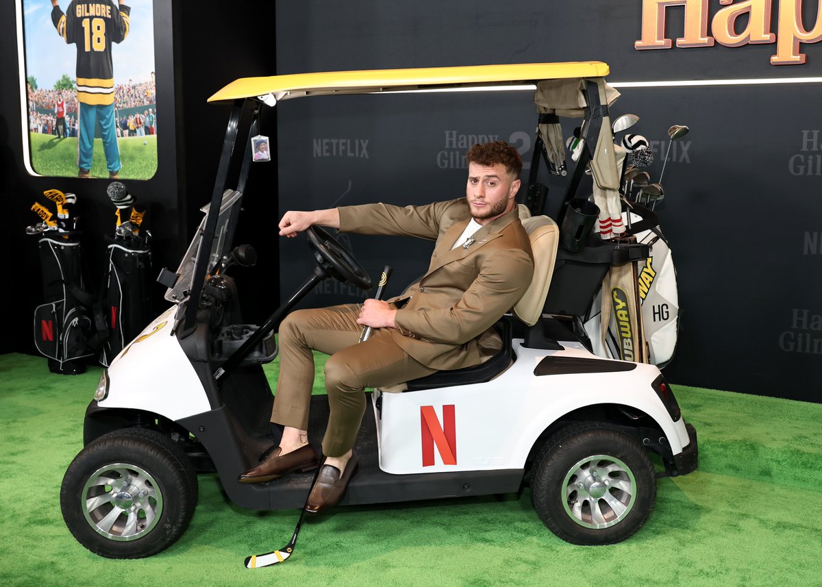 netflix's tweet image. Maxwell Jacob Friedman pulls up to the HAPPY GILMORE 2 premiere | 📸: Getty