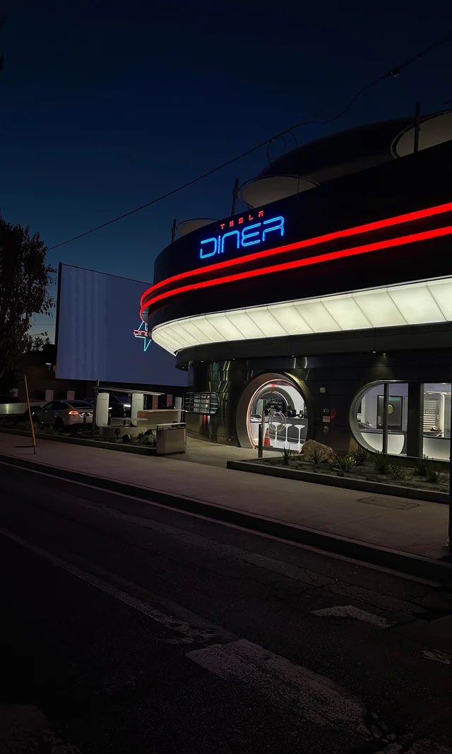 brianychua's tweet image. Architecture trends shine in Tesla Diner: Circular seating, art-deco neon mixed with modern LED for that nostalgic high-tech vibe. Stantec’s design adapts an old site into a versatile EV hub—classic retro-futurism reimagined. I dig the old-new blend!  
#RetroFuturism #TeslaDesign