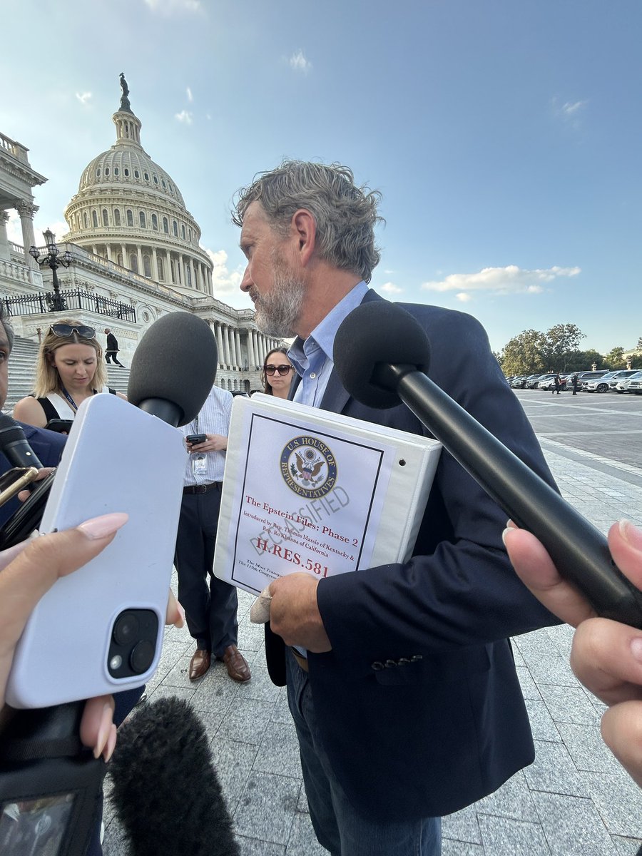 Chesschick01's tweet image. Thomas massie holding Phase 2 of the Epstein files. His H.Res 581 bill. If you look down at his other hand you can see the screw sticking out of it. He just had surgery and he is in Congress fighting for truth and justice. He is also handing out cards to get more co-signers for…