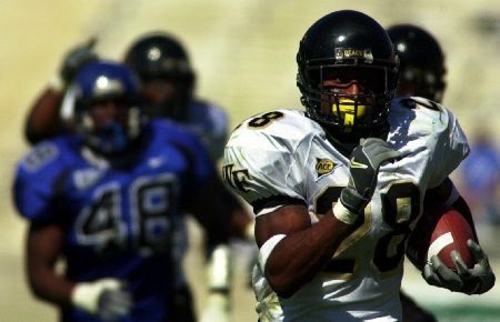 Wesbryant_72's tweet image. Hardest Football Picture (Me in the background with the 1️⃣ ☝🏾 after we broke a long TD run by @CoachCBarclay that came off my keester)