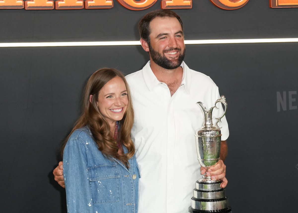 AlexMyers3's tweet image. Looks like Scottie Scheffler flew straight to New York for the premier of "Happy Gilmore 2." Claret jug in hand, of course.