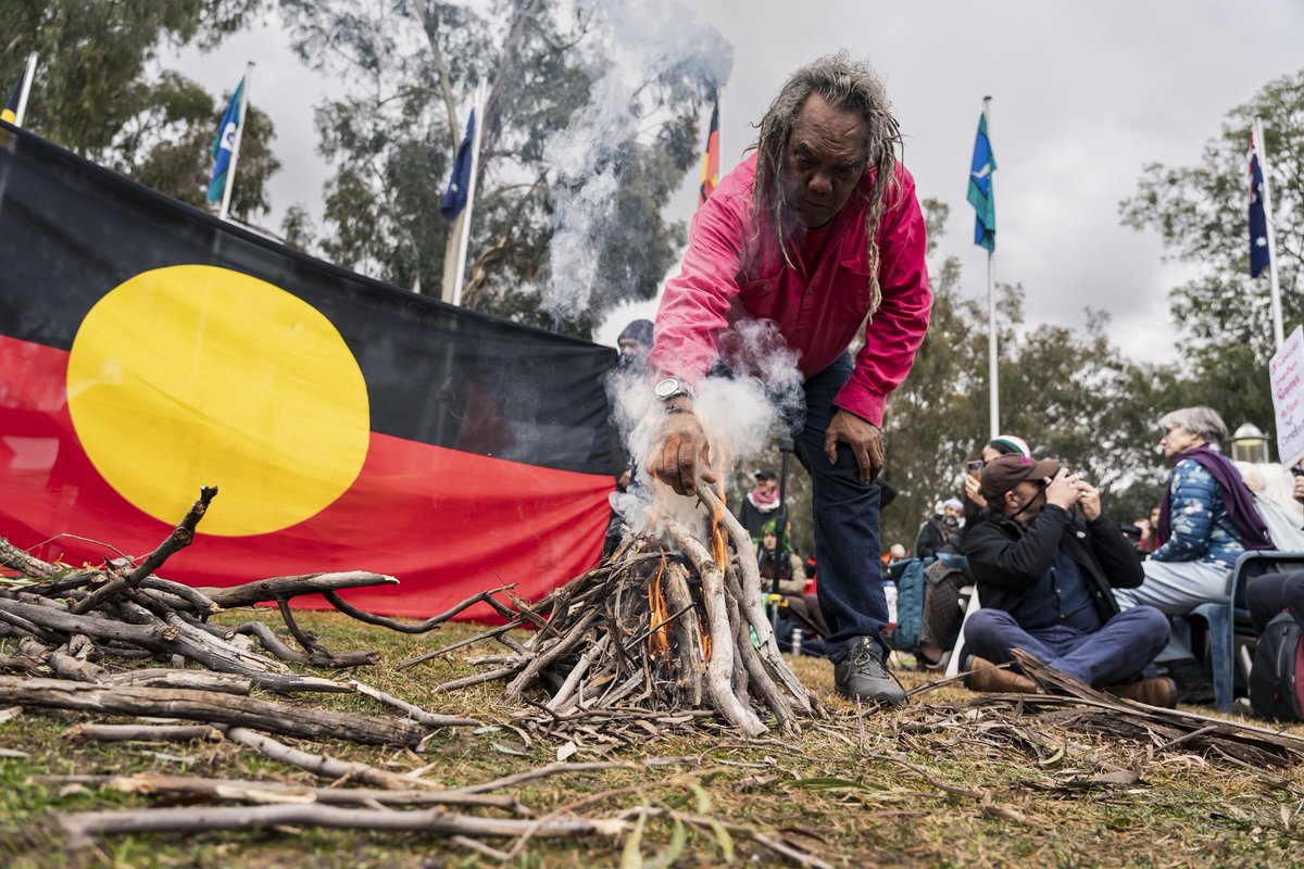 MattH093's tweet image. Uncle Wayne ‘Coco’ Wharton doing a smoking ceremony for the Palestine rally at the front of Parliament House, Canberra.
(Image copyright ©️ me.)