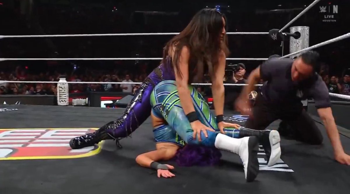 WrestleOps's tweet image. Roxanne and Raquel retain the Tag Titles against Bayley and Lyra.
#WWERAW