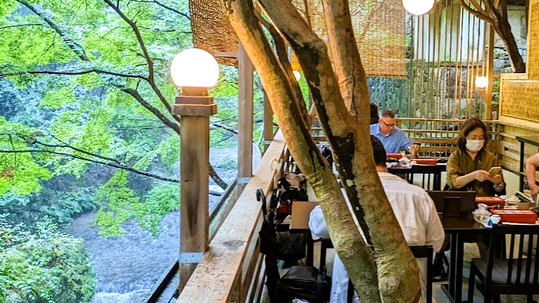Tokyonobo's tweet image. After enjoying the Gion Festival float parade, we had lunch at a restaurant overlooking the mountain stream in Shozan Resort. Because it had been raining, the usually clear mountain stream was murky. #しょうざんリゾート京都