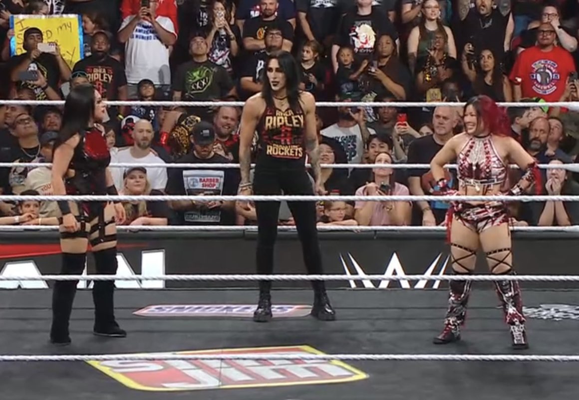 RheaWrestles's tweet image. They might’ve just shown us our mania world title match 9 months in advance