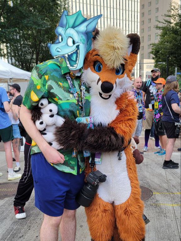 Suiters and friends! <a href="/BirbsWings/">Birds 🇨🇦</a> <a href="/crazikyle/">crazikyle</a> <a href="/HigherMammal/">🍖 barbeque 🦨</a> <a href="/ArcticFoxHiro/">🐾 Flynn 🦊 🔜 canfur 🐾</a> 

Here's to hoping next year I'll be in suit myself :)