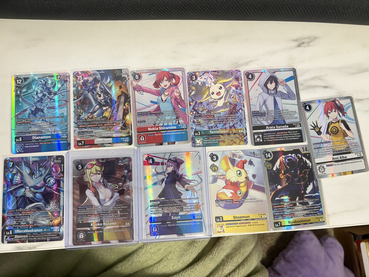 Alyssandriaaa's tweet image. Cosplayer luck while pulling Digimon cards is real 🤩