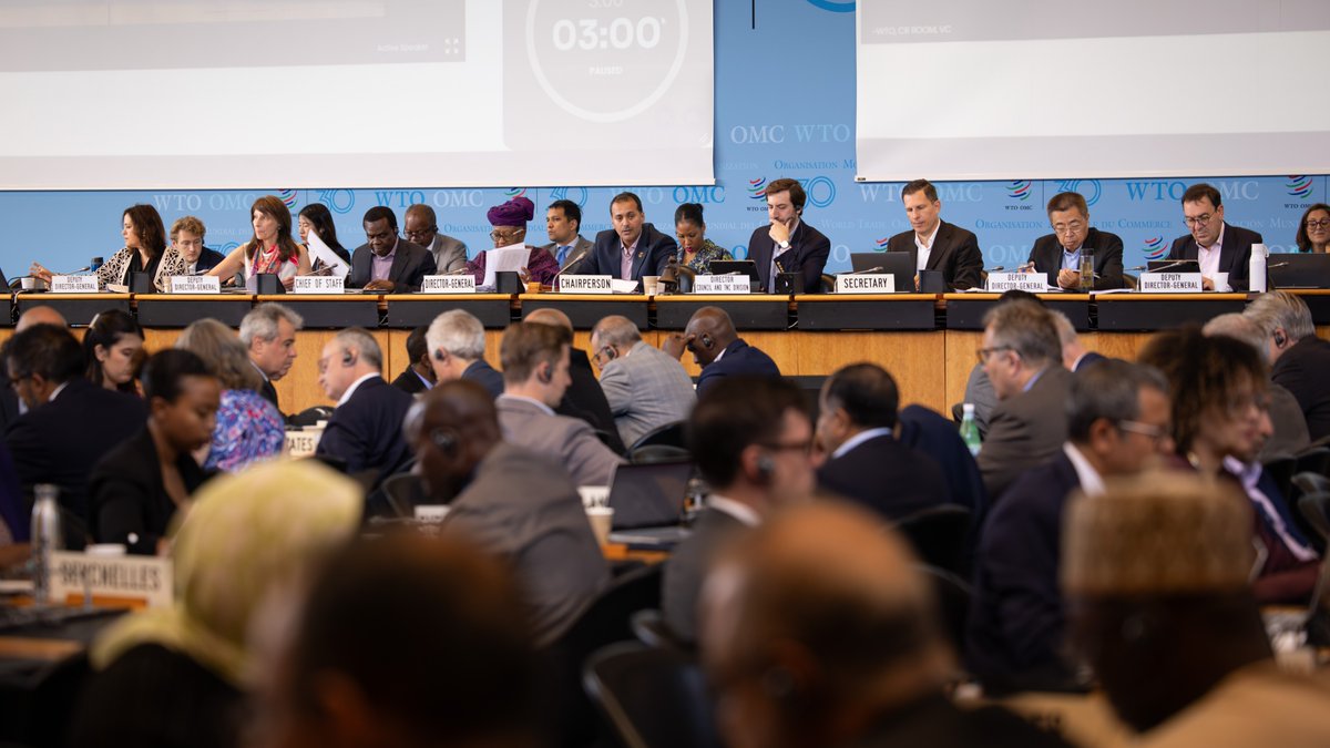 wto's tweet image. Happening now: General Council meeting. Members are reviewing 16 agenda items, including the budget, MC14 preparations, recent trade developments, and more. Facilitators on WTO reform and e-commerce will also present their reports to the Council.