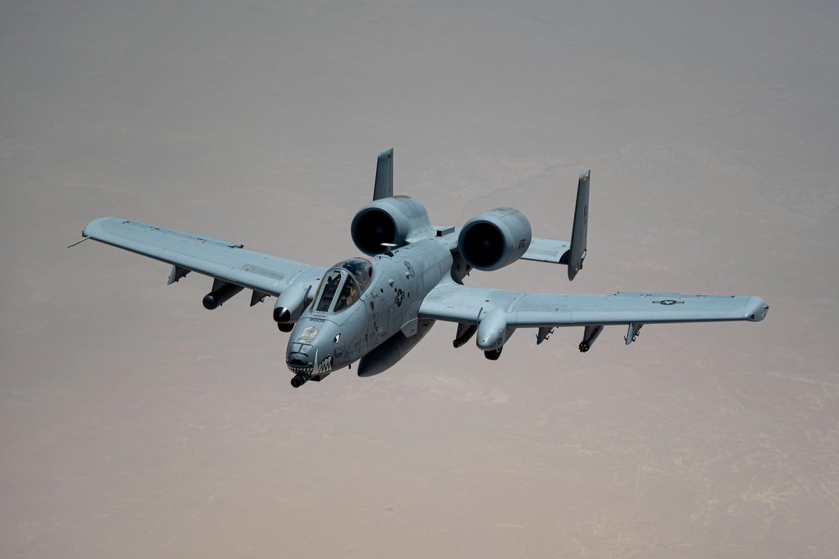 CENTCOM's tweet image. U.S. Air Force A-10 Thunderbolts maintain continuous air patrol capability after receiving fuel from a KC-135 Stratotanker over the U.S. Central Command area of responsibility.