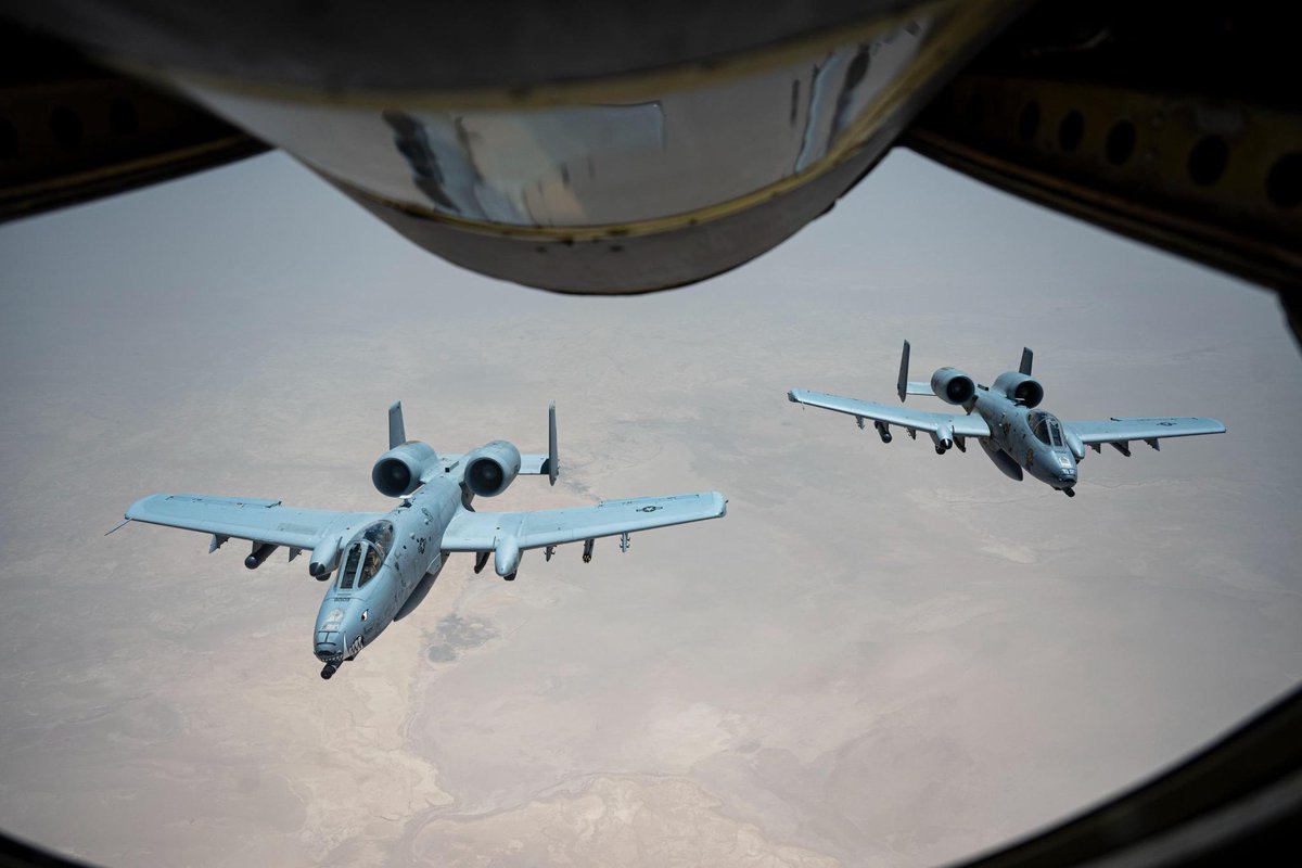 CENTCOM's tweet image. U.S. Air Force A-10 Thunderbolts maintain continuous air patrol capability after receiving fuel from a KC-135 Stratotanker over the U.S. Central Command area of responsibility.