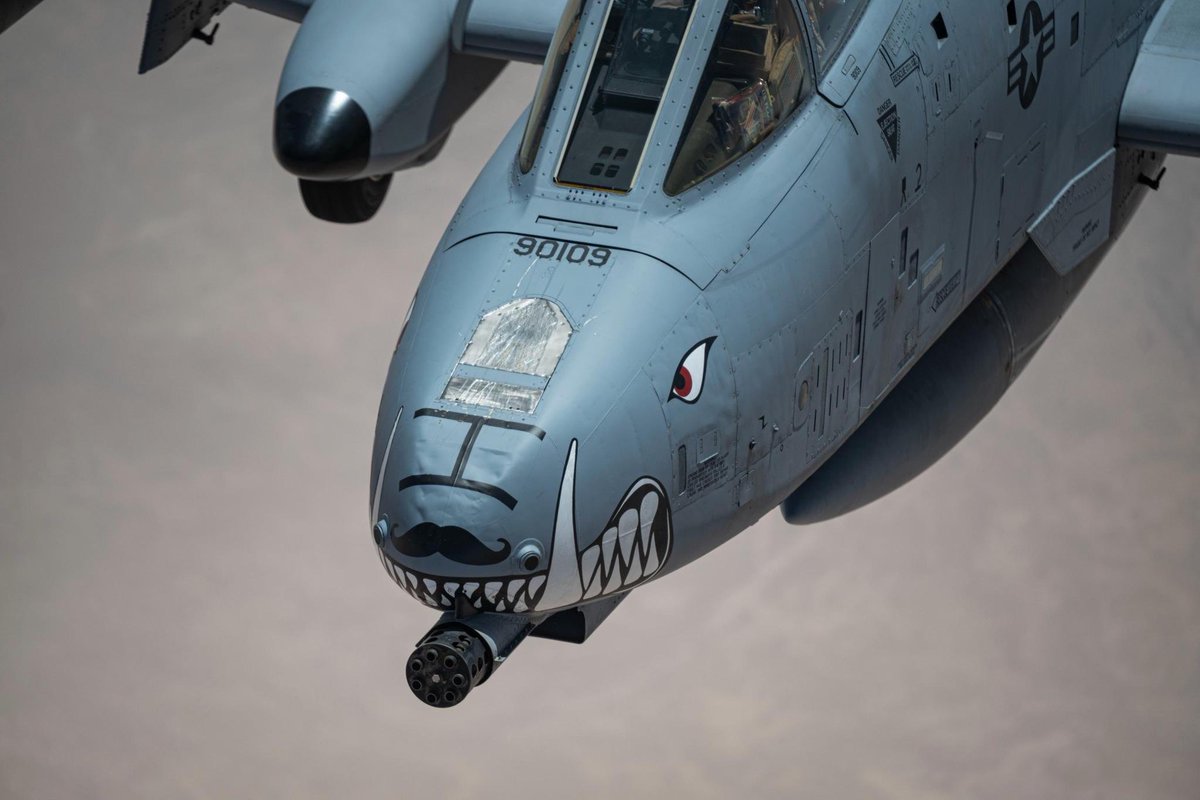 CENTCOM's tweet image. U.S. Air Force A-10 Thunderbolts maintain continuous air patrol capability after receiving fuel from a KC-135 Stratotanker over the U.S. Central Command area of responsibility.
