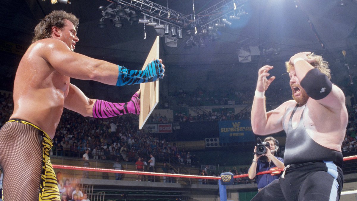 WWFWrestling1's tweet image. Looks like the Barber has another unsatisfied customer! ✂️ #WWF #WWE #BrutusBeefcake