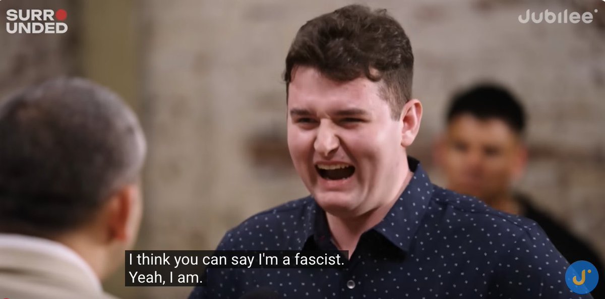 ThePoliticalHQ's tweet photo. The man named “Connor” who recently appeared in the “1 Progressive vs 20 Far-Right Conservatives” Jubilee video has been fired from his job.

Connor’s time on the episode was highlighted by his refusal to condemn the Nazi Holocaust against the Jews, praising Francisco Franco who killed innocent women and babies and embracing the label of “fascist” when referring to himself.