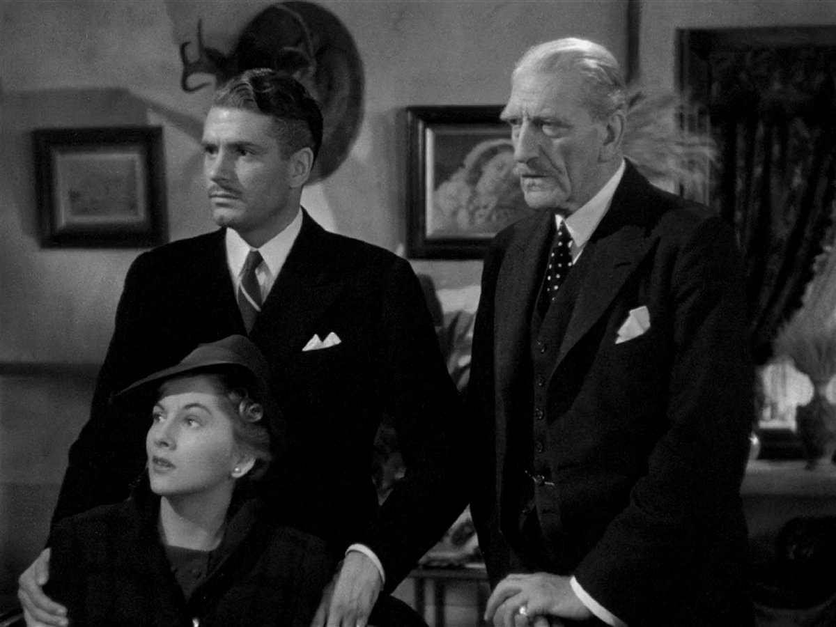 ClassicMovieHub's tweet image. Joan Fontaine, Laurence Olivier, and C. Aubrey Smith in Rebecca, 1940...