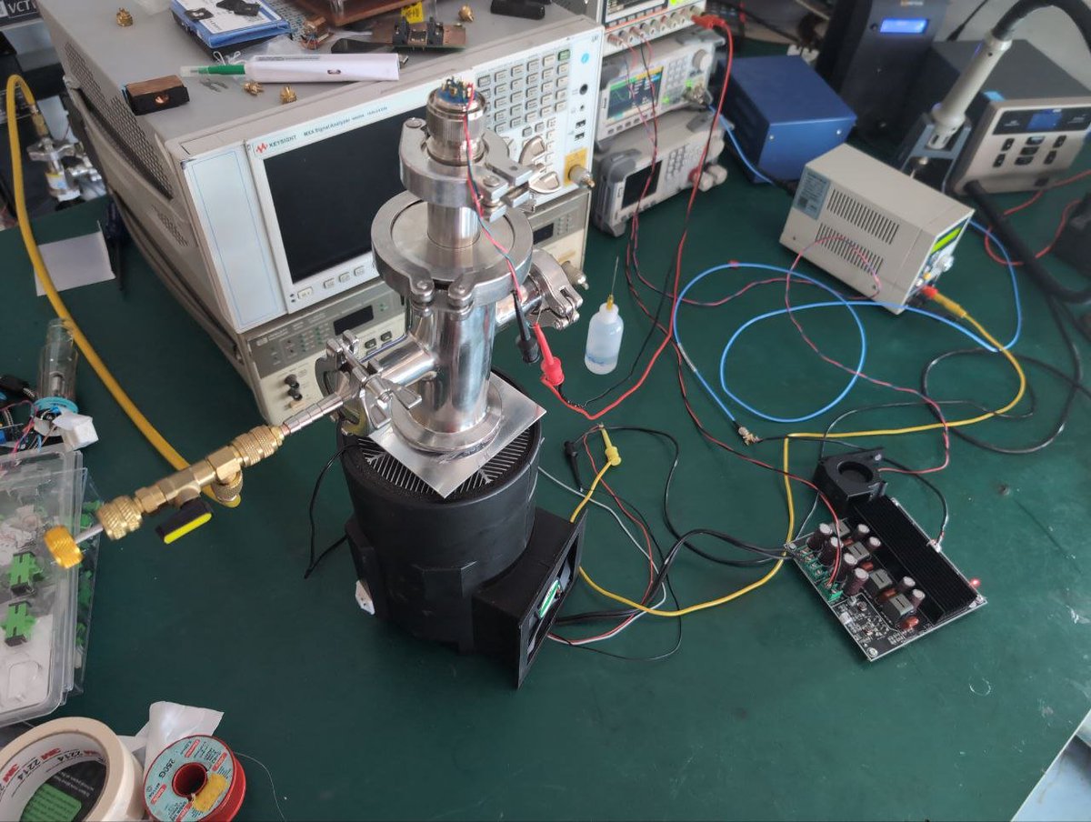 Cheap GH0631IA5G laser diode in cheap vacuum chamber on cheap Stirling cooler (cloned all over China) = 614nm laser (Ba+ D5/2 repumper) under $1000