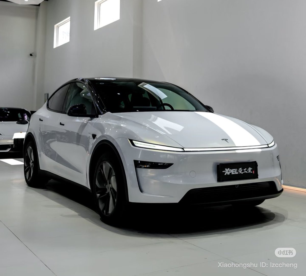 The Tesla Newswire tweet media