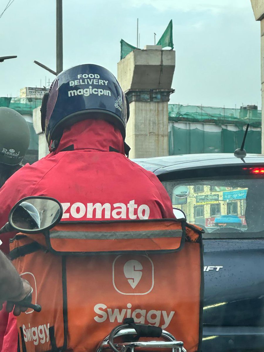 SumitJasoria's tweet photo. This can only happen in Bangalore.
@Swiggy @zomato and @mymagicpin on same rider. kudos to gig economy 👍 https://t.co/eX4EaIJM4r