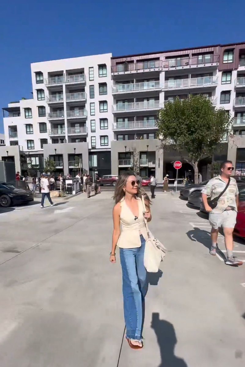 teslaunivrse's tweet image. I noticed residential buildings next to the Tesla Diner. Do they get disturbed by the bright, giant movie screens on 24/7?