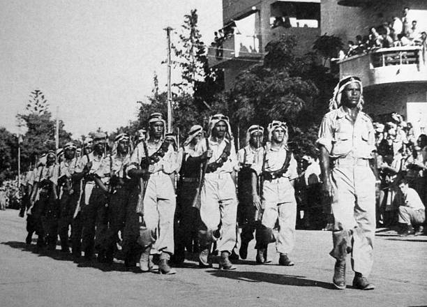 Druze soldiers of the Israel Forces parade on the first anniversary of Independence in 1949