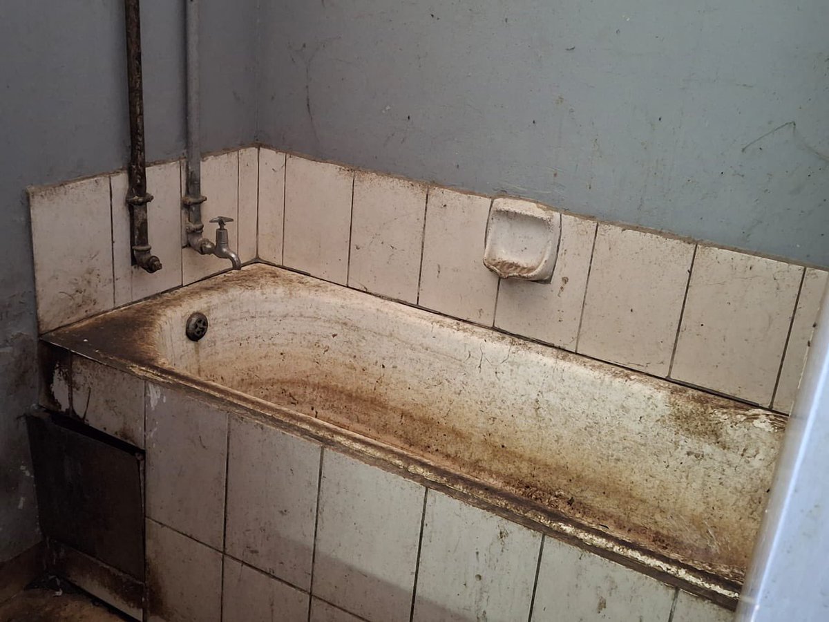 LuyoloMphithi's tweet photo. DA colleagues and I visited the Helen Joseph’s Women’s Hostel. Millions reportedly spent last year according the reports but there is: 
🛑 Raw sewage.
💡 No lights.
🚱 No water.
🏚️ Unsafe, undignified living.

It is a human rights crisis. I will be taking a petition to Parliament https://t.co/jt8BRu5qXv