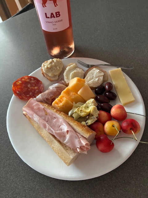 Nickyboy63's tweet image. Cold dinner last night. Mortadella and butter on ficelle, salami, prosciutto and melon, artichoke hears, olives, cherries, Gruyere, Harbison on bread, and taleggio on bread. With a rose.