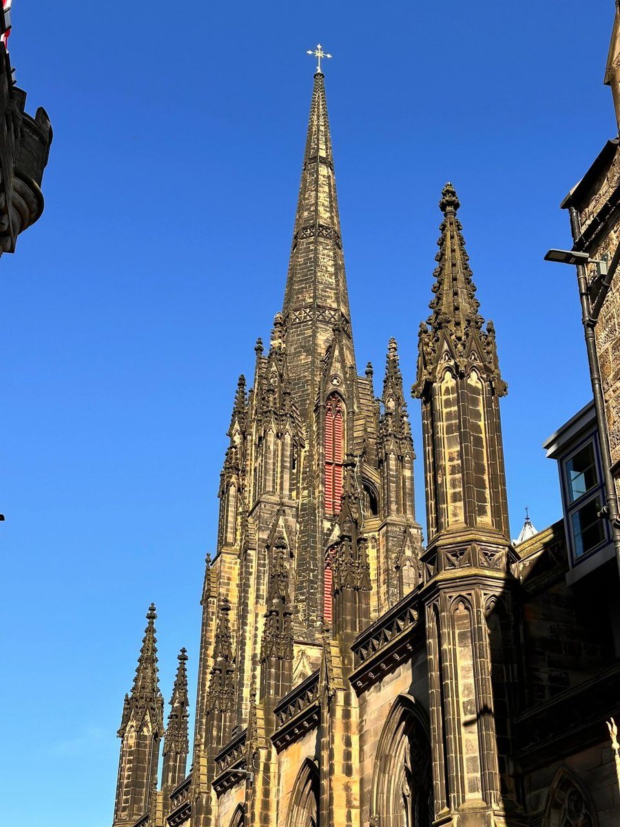 Reaching for the sky, this magnificent church spire pierces the vibrant blue ✨