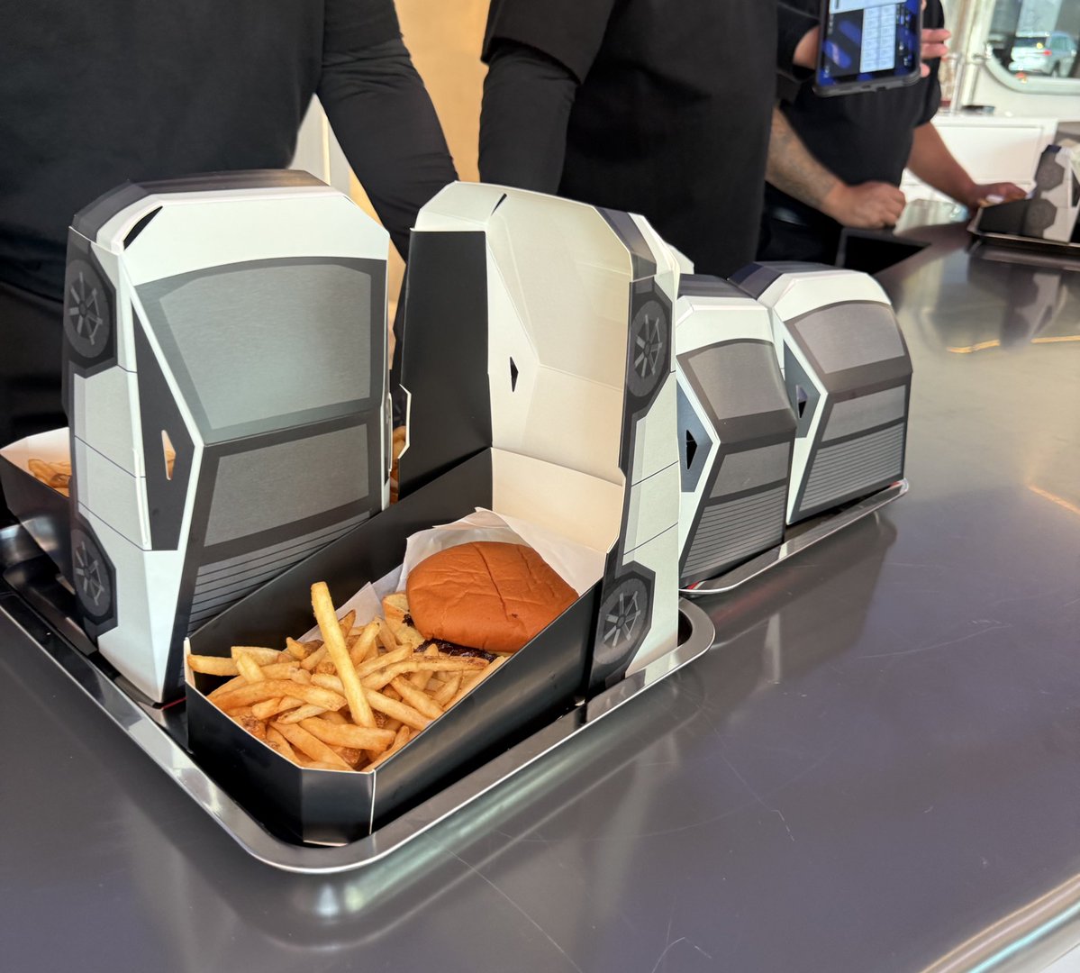 mark_k's tweet image. POV: Your new Tesla arrives.
"Would you like fries with that?"