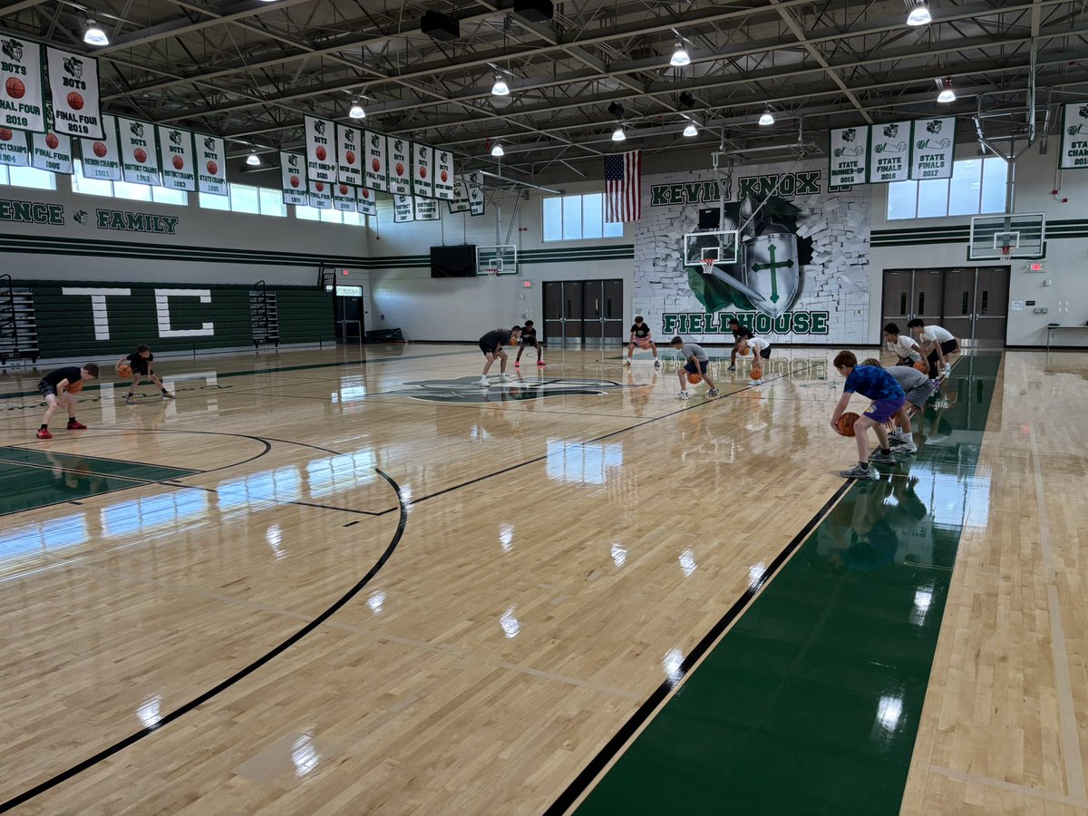 TC asst. coach Thomas Dziagwa working during his offensive skills mini-camp with his campers.