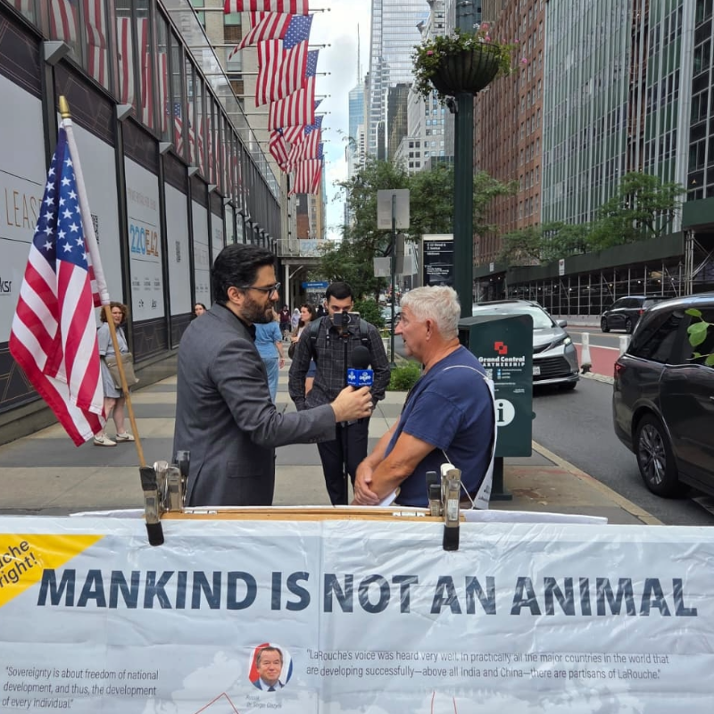 TLO Organizer Bruce Todd--retired Millwright--is interviewed by international press on the sidewalks of Manhattan, June 21, 2025.
