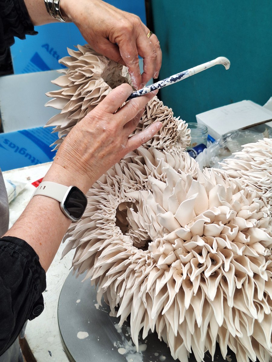 Working through lunch on a Tuesday.
NSF ceramic artist Nuala O'Donovan, assembling one of her largest teasels to date.