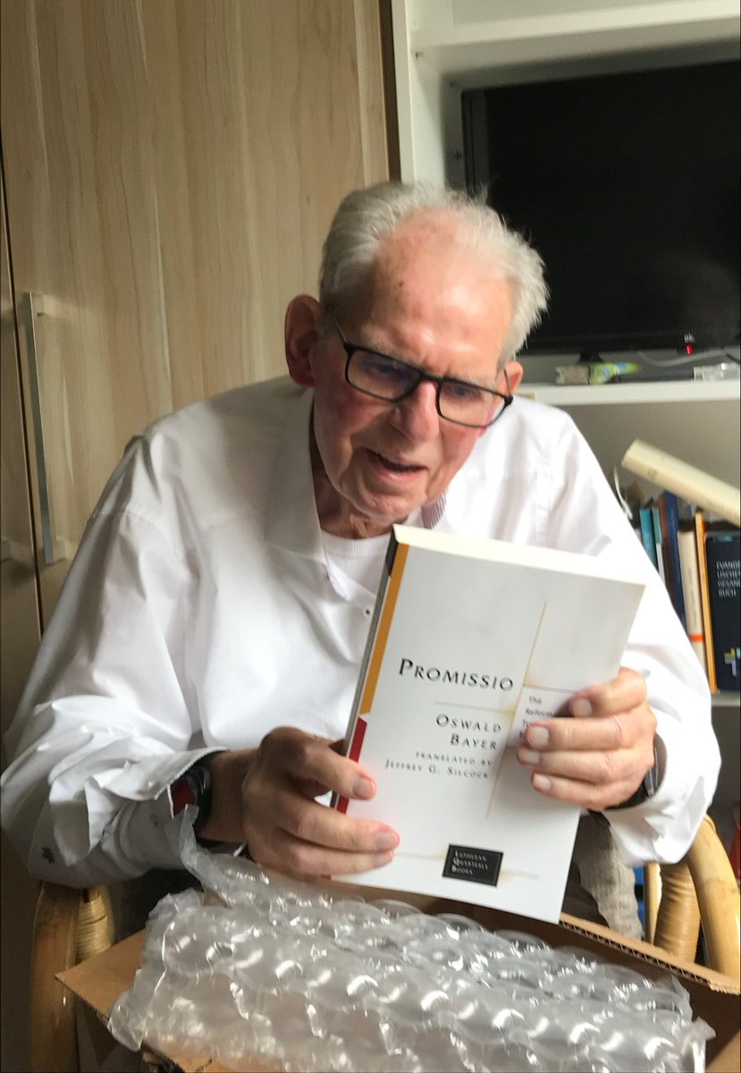Oswald Bayer receiving his copy of Promissio in English – his own groundbreaking work available to a new audience as Lutheran Quarterly’s thirtieth book in our series.