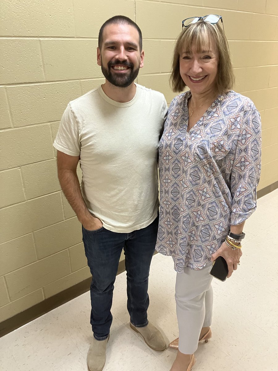Shay Mooney of Dan And Shay visits with emcee of VB Mayors Prayer Luncheon, Karen Pharis GM of Fort Smith Radio Group