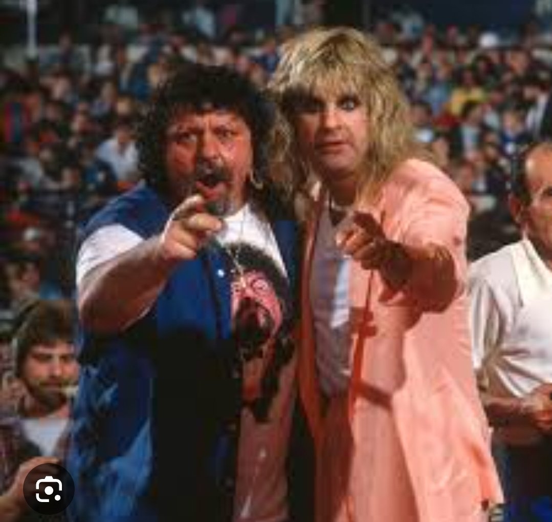 OldWrestlingPic's tweet photo. RIP heavy metal legend Ozzy Osbourne. He appeared at WrestleMania 2 in 1986, managing the British Bulldogs during their tag team title win. He was also a guest host on Monday Night Raw in 2009 and was inducted into the WWE Hall of Fame in 2021. 🎶🤘 https://t.co/zg62r0epBc