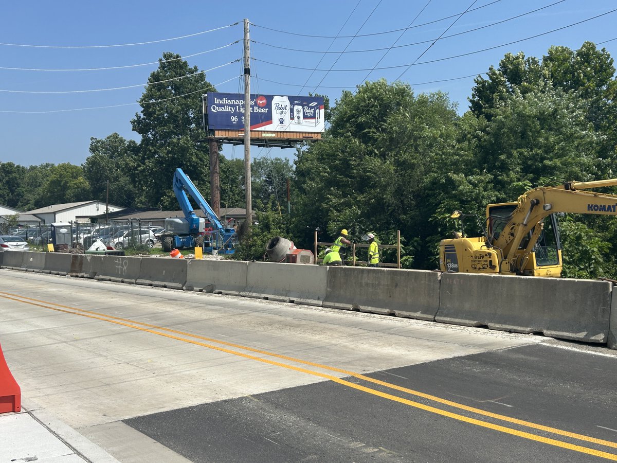 IndyDPW's tweet image. Contractors are continuing work on the Lafayette Road bridge over Little Eagle Creek. This bridge was originally built in 1923 and widened in 1935. Crews are repairing existing arches, and will construct a partial new asphalt roadway, bridge railings and sidewalks.