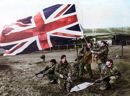 Empireaesth's tweet image. British Forces raise the Union Flag over the Falkland Islands after retaking them from Argentinian Forces (1982)