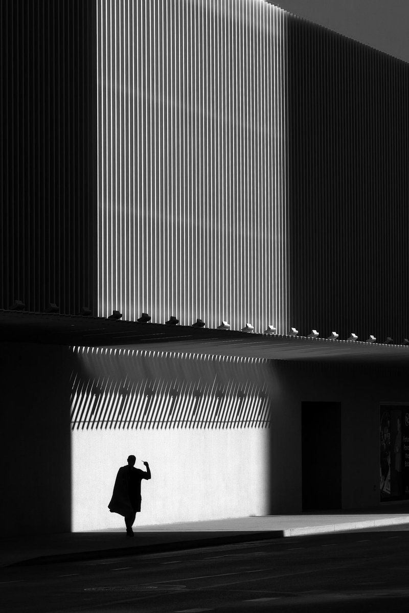 AdamCarity's tweet image. While the world prompts itself into oblivion, I’m still pointing my camera at what’s real.
‘Caped Crusader’ — Pillar of Light
Candid randoms in Downtown Phoenix.
0.25 — Fine Art Print Included.