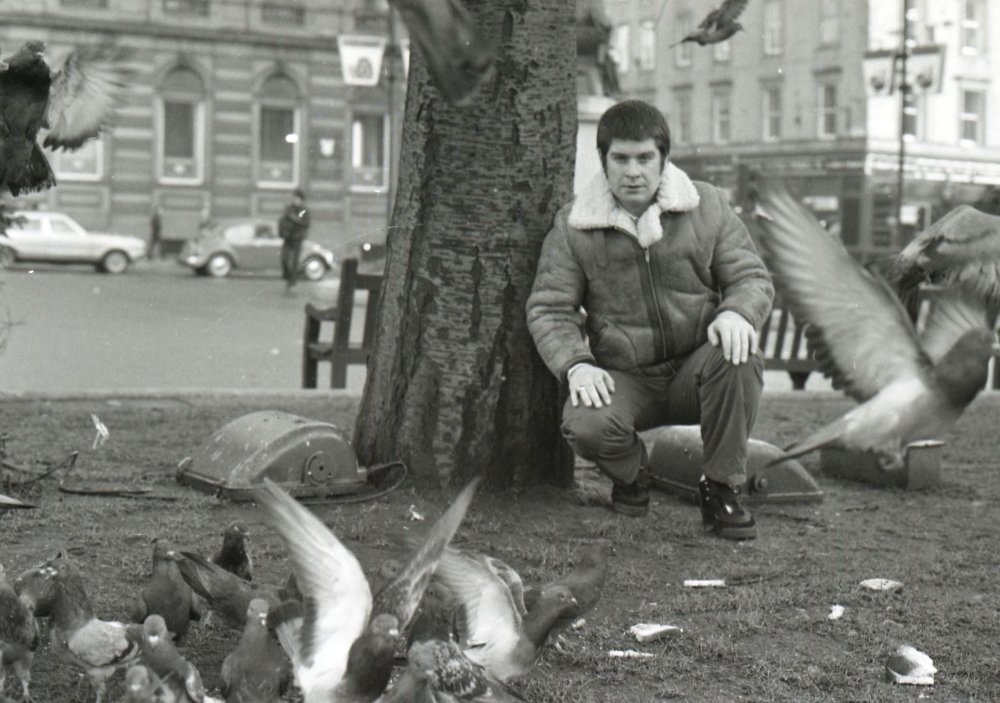 Ozzy Osbourne feeds pigeons in George Square, Glasgow. (1982)