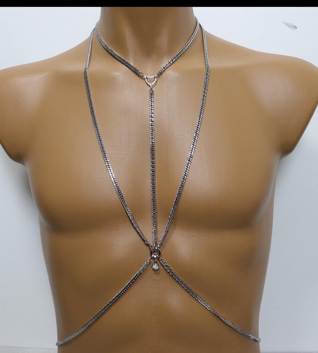 loustatsx's tweet image. is he wearing a body chain or…but it doesn’t look like jewelry?