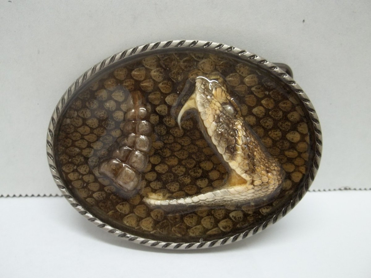 SmalltimeJones's tweet image. these are the kind of belt buckles you wear when you want people to know you get kinda fighty after a couple titos n crans so best to tread lightly there bossman