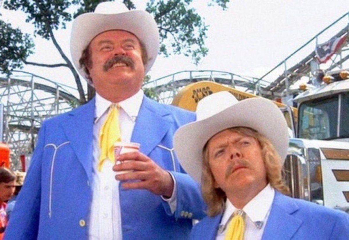 Two cultured men who appreciated an ice cold Coors.
